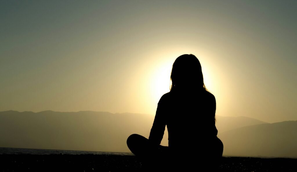 Woman Meditating | Oasis Massage